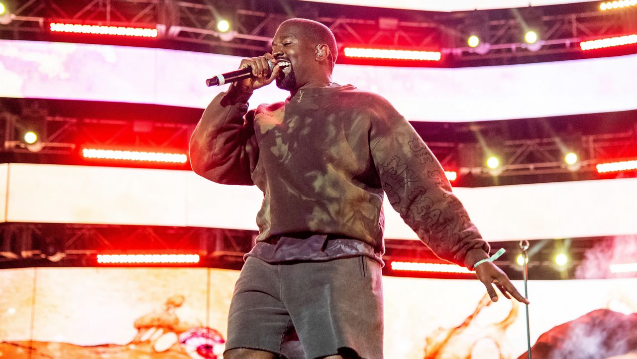 Kanye West, seen here in a 2019 California concert, performs tonight at Raymond James Stadium in Tampa. (Photo by Amy Harris/Invision/AP)