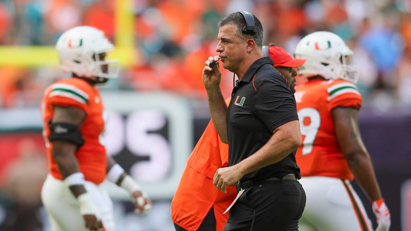 Sep 9, 2023; Miami Gardens, Florida, USA; Miami Hurricanes head coach Mario Cristobal looks on against the Texas A&M Aggies during the first quarter at Hard Rock Stadium. Mandatory Credit: Sam Navarro-USA TODAY Sports