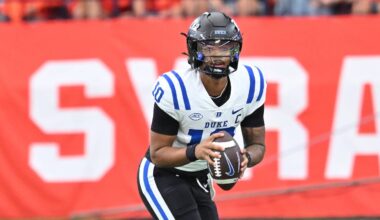 Sep 27, 2025; Syracuse, New York, USA; Duke Blue Devils quarterback Darian Mensah (10) runs out of the pocket in the first quarter against the Syracuse Orange at the JMA Wireless Dome. Mandatory Credit: Mark Konezny-Imagn Images