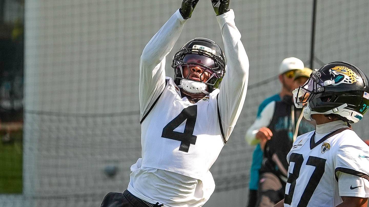 Jacksonville Jaguars cornerback Jarrian Jones (4) catches a pass over Jacksonville Jaguars cornerback Jabbar Muhammad (37) during a drill as the Jaguars held their final Organized Team Activity on Monday, June 15, 2026 at the Miller Electric Center in Jacksonville, Fla.