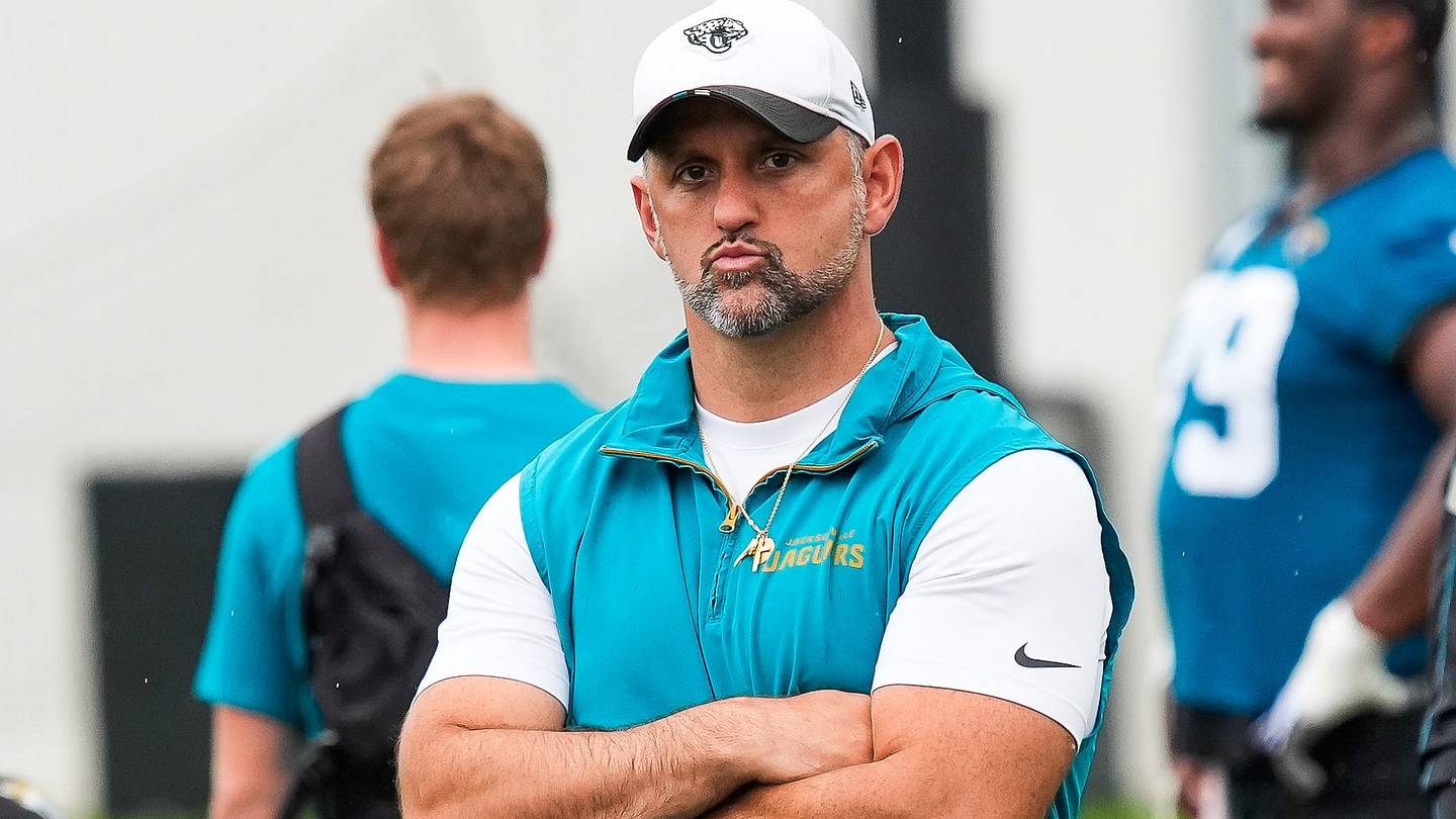 Jacksonville Jaguars defensive coordinator Anthony Campanile, center, stands over his crew after the second day of minicamp at the Miller Electric Center, Wednesday, June 10, 2026, in Jacksonville.