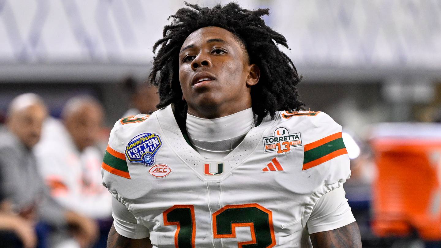 Dec 31, 2025; Arlington, TX, USA; Miami Hurricanes defensive back Bryce Fitzgerald (13) walks off the field after the 2025 Cotton Bowl and quarterfinal game of the College Football Playoff at AT&T Stadium. Mandatory Credit: Jerome Miron-Imagn Images