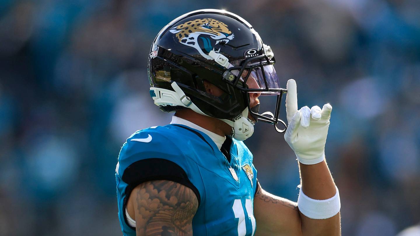 Jacksonville Jaguars wide receiver Parker Washington (11) reacts to his first down pickup during the third quarter of an NFL football AFC Wild Card playoff matchup, Sunday, Jan. 11, 2026, in Jacksonville, Fla. The Bills defeated the Jaguars 27-24. [Corey Perrine/Florida Times-Union]