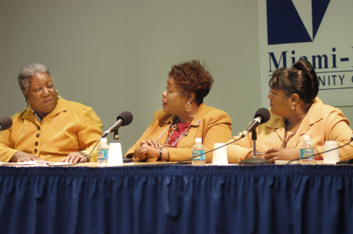 In this file photo from March 3, 2003, Alexandria Holloway, dean of Miami Dade College’s Honors College (left), mediates a discussion on women in the ministry with panel guests Rev. Mary Tumpkin and Rev. Carol Nash.