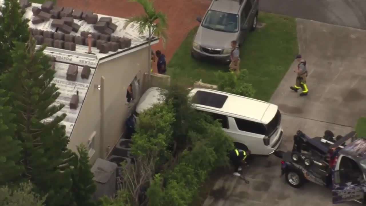 SUV crashes into NW Miami-Dade home, hits gas line; no injuries reported - WSVN 7News | Miami News, Weather, Sports