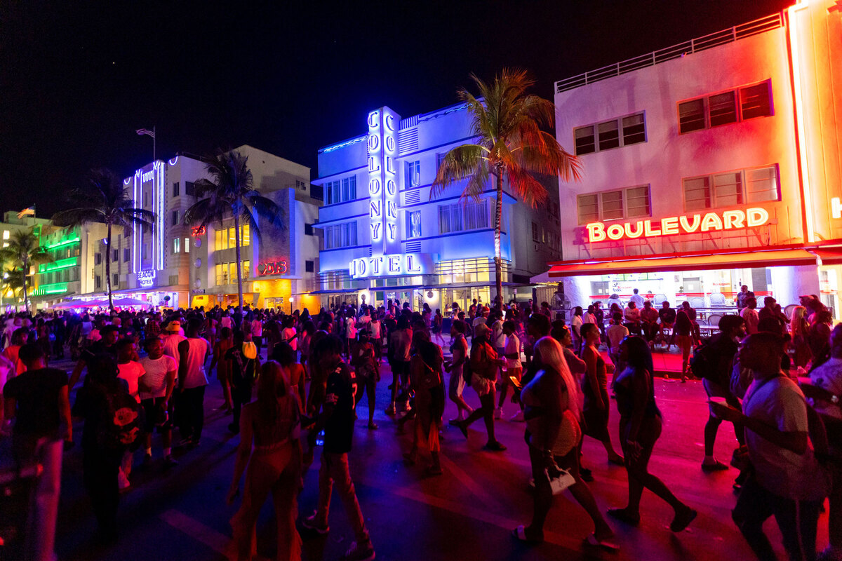 Crowds walk up and down Ocean Drive during spring break in Miami Beach on March 18, 2023.