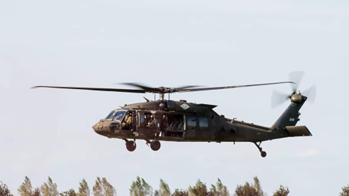 A U.S. Air Force Sikorsky UH-60 Black Hawk from the 101st Airborne Division at the scene of an air attack demonstration commemorating Operation Market Garden in The Netherlands. A U.S. Air Force Sikorsky UH-60 Black Hawk from the 101st Airborne Division at the scene of an air attack demonstration commemorating Operation Market Garden in The Netherlands.