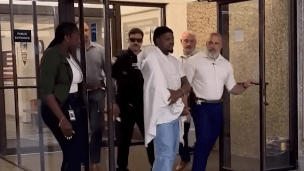 Investigators said a dispute occurred outside the home between the woman and 29-year-old Trudale Reed. During the argument, Reed allegedly fired multiple rounds, striking the woman and both children before fleeing the area in a stolen SUV. (JSO)