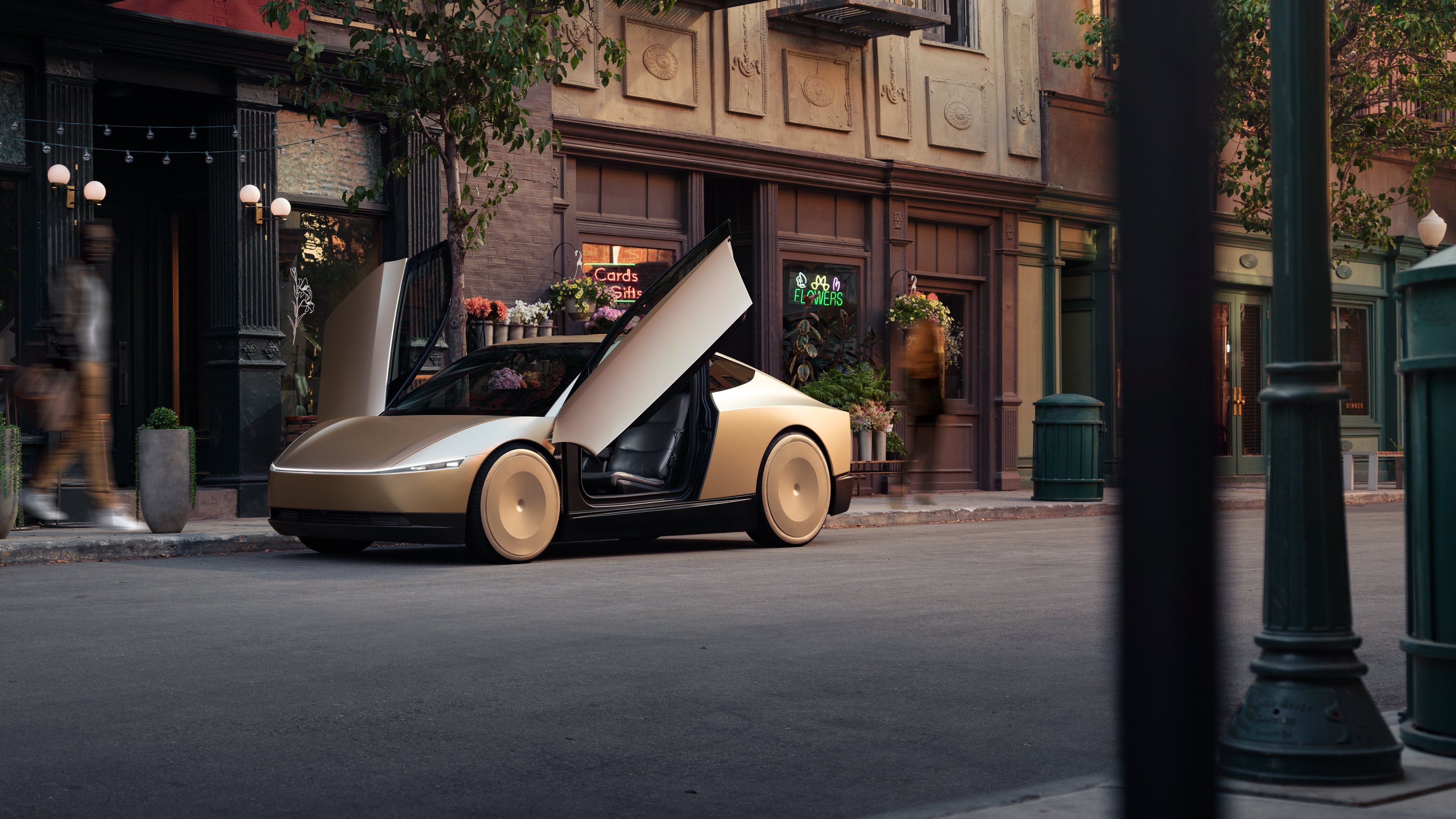 A cybercab on the side of the road.