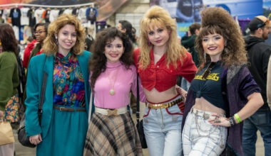 people posing in vintage clothing