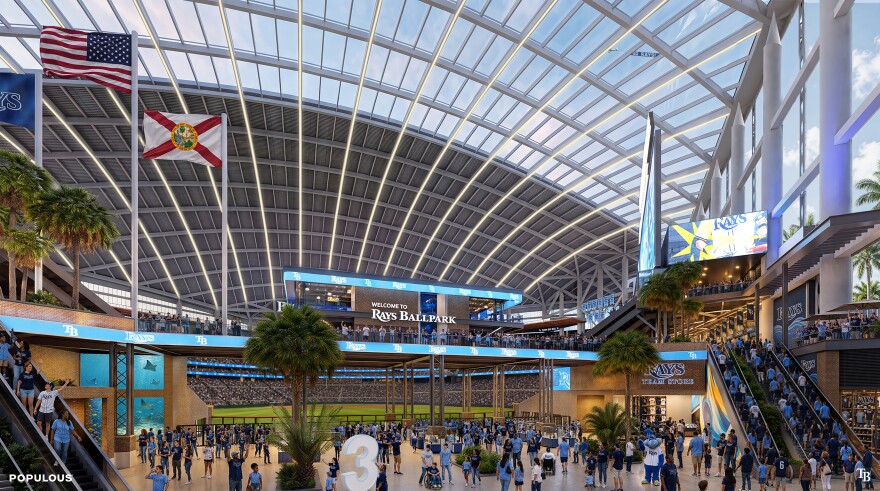 A rendering shows the entry to a stadium with a crowd in the foreground and a large glass ceiling overhead