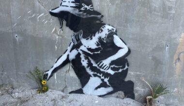 Banksy-esque street art from UK artist DNZ lasts one day at John's Pass Bridge