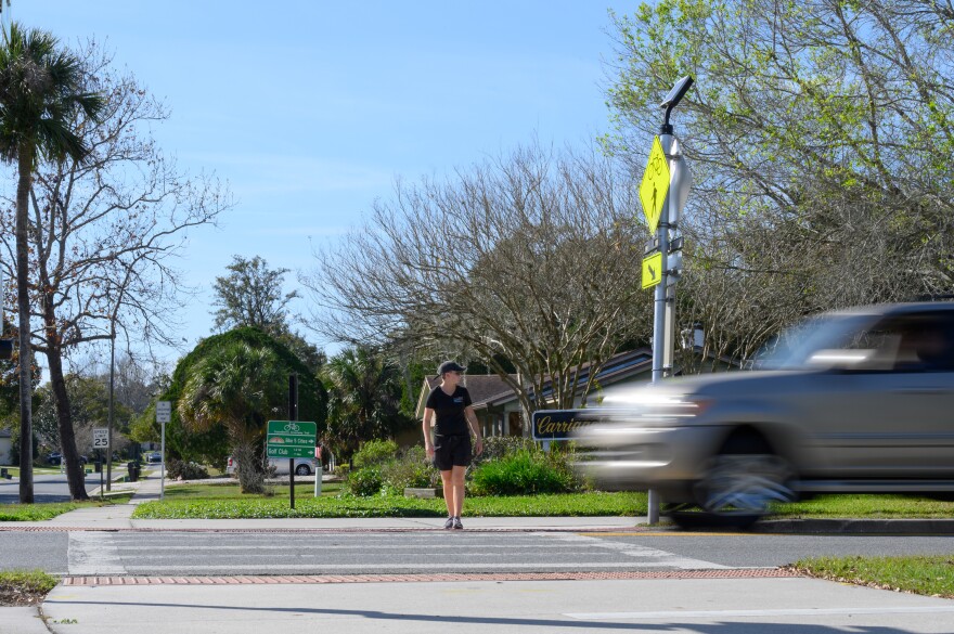 A car approaches an intersection someone is trying to cross during a “Best Foot Forward” operation in Casselberry in 2023.