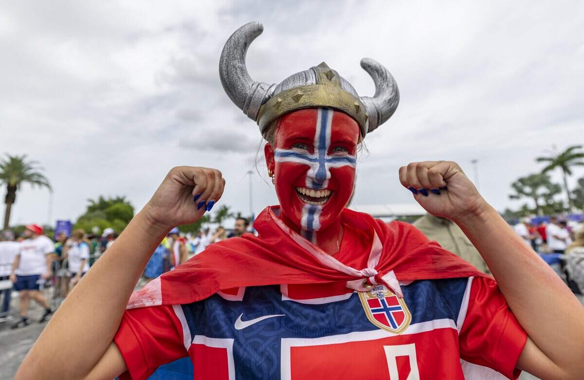 Norway fan Charlotte Bjercke cheers as she arrives to watch her team play against England in a FIFA World Cup 2026 Quarter Final soccer match at Hard Rock Stadium (Miami Stadium) on Saturday, July 11, 2026 in Miami Gardens, Fla.