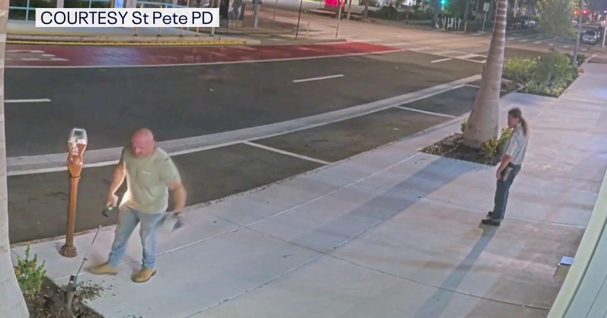 Police search for men after St. Pete apartment building vandalized