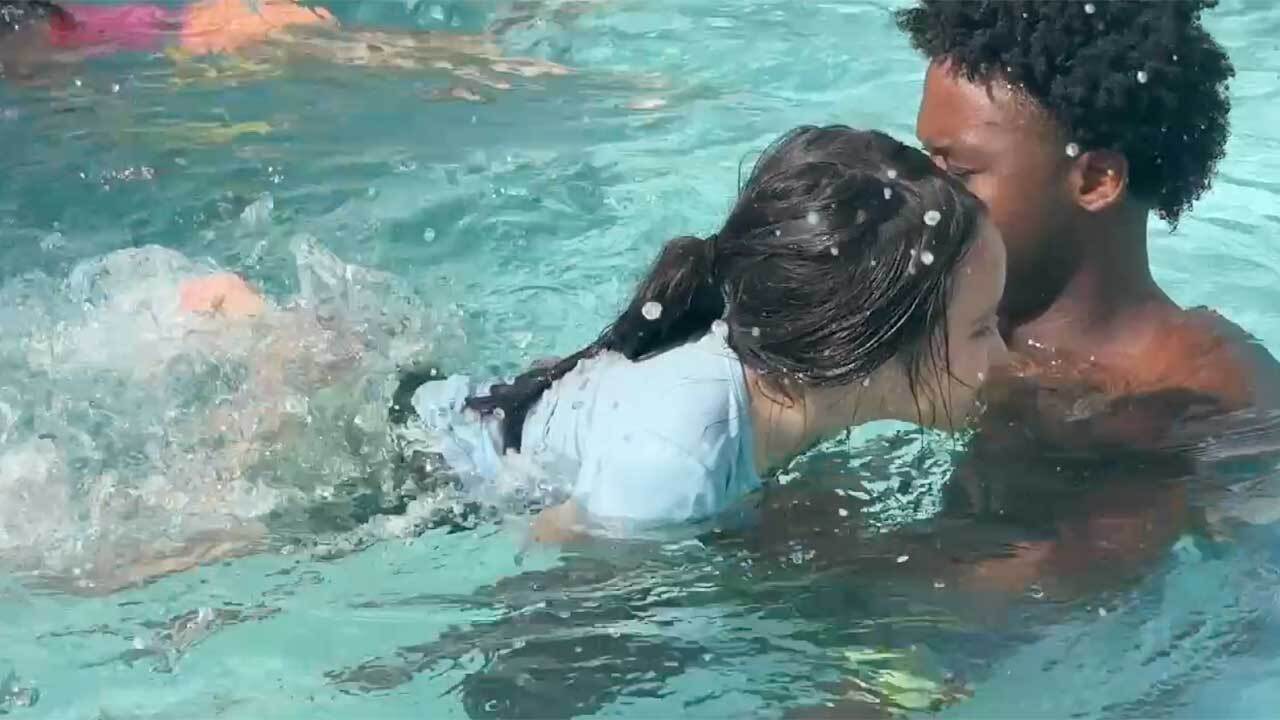 Child swimming at Pioneer Park Aquatics Center in Belle Glade