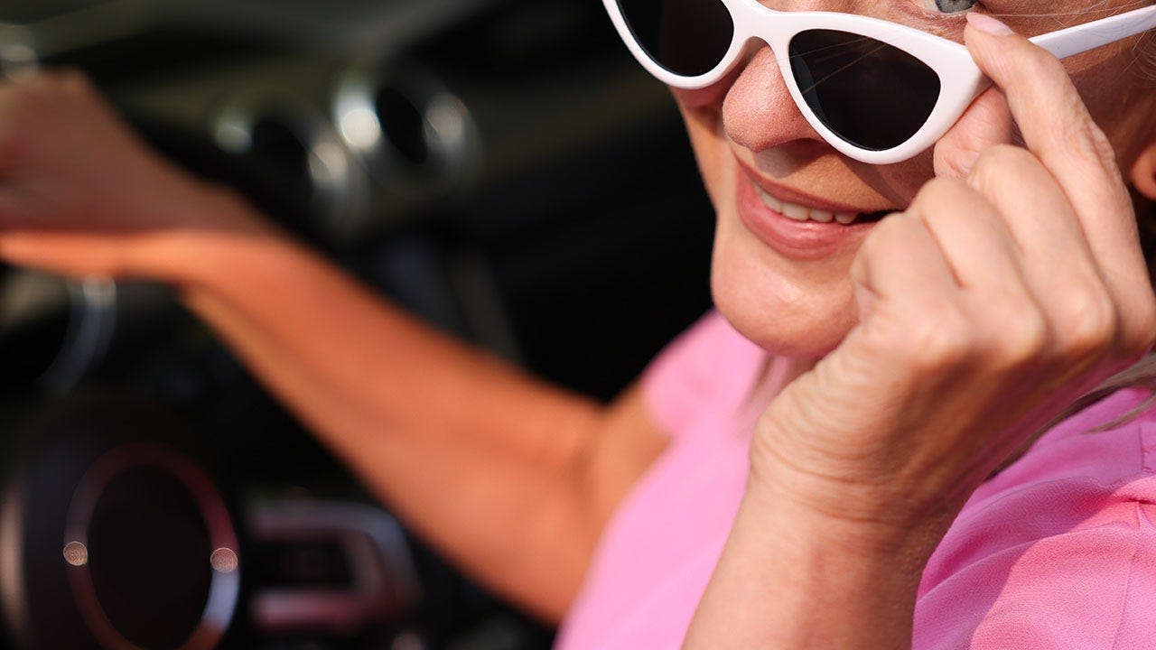 Do not SQZ this elderly Florida woman's A55, no matter what her new license plate says