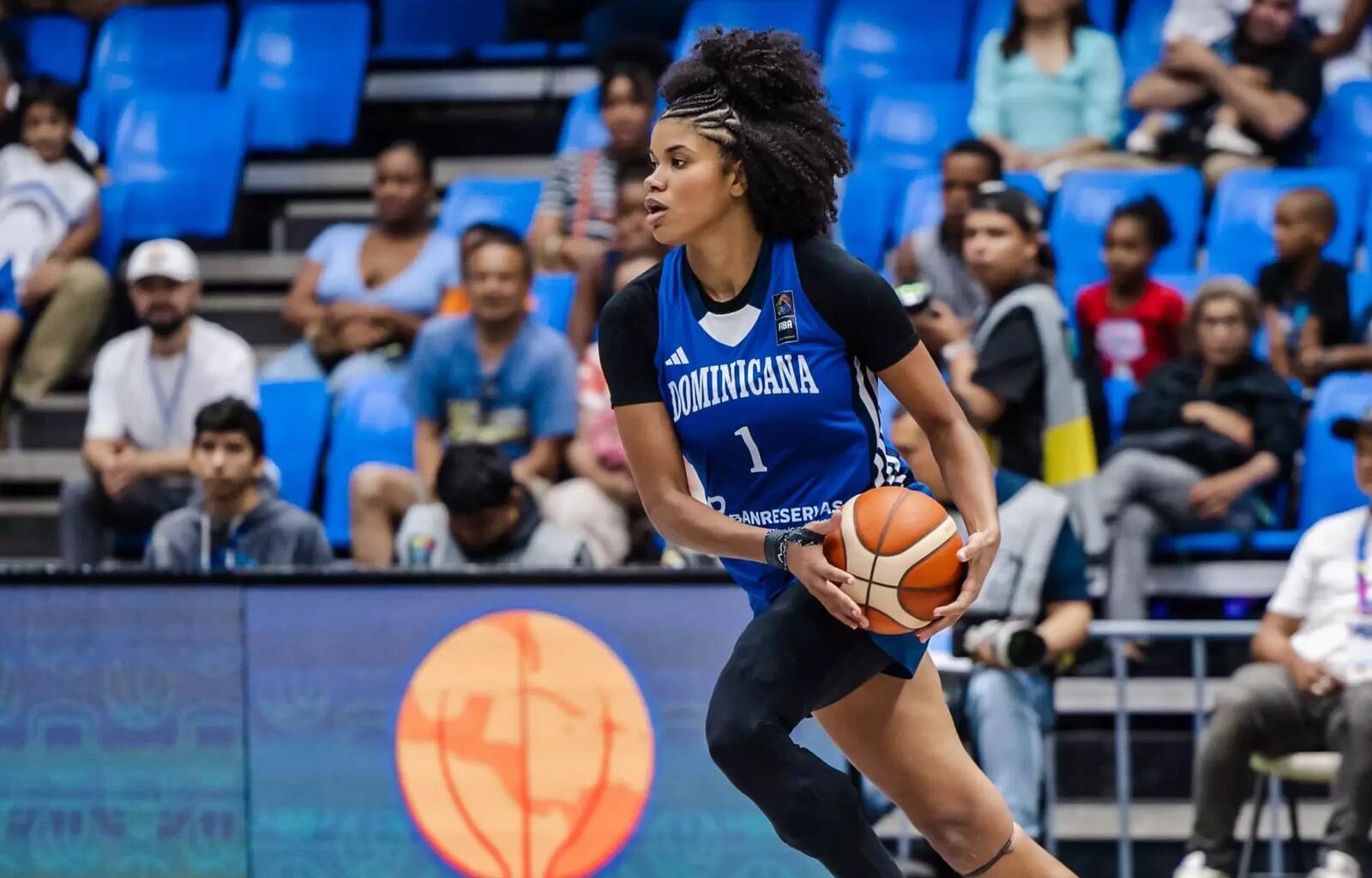 Aurora Almón celebrates with her Dominican Republic Teammates