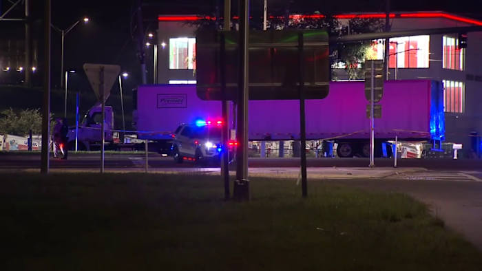 Driver killed after running red light, hitting semi-truck in Orange County, FHP says