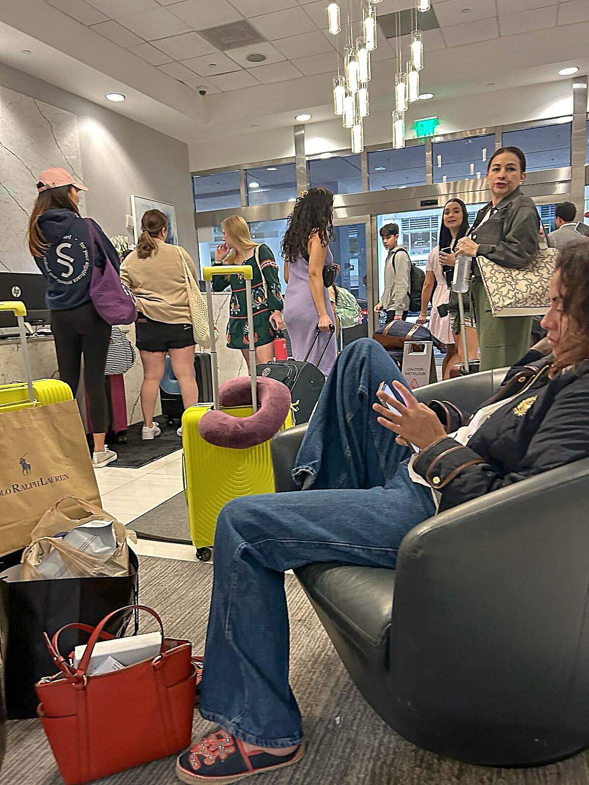Airbnb guests gather in the lobby of The Club at Brickell Bay condo where 85 percent of the units are rentedthrough Airbnb and other vacation sites.Residents of The Club at Brickell Bay, a condo tower where 85 percent of the units are rented through Airbnb and other vacation sites, are fighting to reclaim their once peaceful life