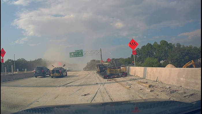 Semi-flips on I-95 South at MLK Pkwy in Jacksonville