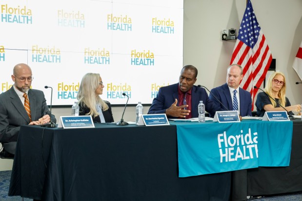Florida Surgeon General Dr. Joseph A. Ladapo, center, speaks about concerns regarding children's mental health during a roundtable discussion at the Orange County Health Department on Friday, July 24, 2026. Panelists who joined Ladapo included, from left: Dr. Kristopher Kaliebe, professor of psychiatry at the University of South Florida; Dr. Lisa Santos Spector, co-director of the Central Florida Behavioral Health Hub; Brian Meyer, deputy secretary of Medicaid at the Florida Agency for Health Care Administration; and Laura Delano, founder of the Inner Compass Initiative. (Rich Pope/Orlando Sentinel)