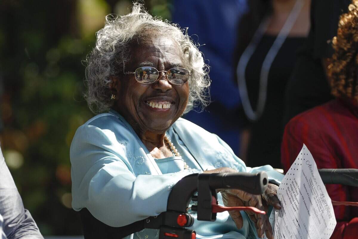 Dr. Enid Pinkney, historian and preservationist, smiles during a ceremony to celebrate the street naming after Alexander C. Lightbourne at the Greater Bethel AME Church in the neighborhood of Overtown in Miami, Florida on Friday, February 10, 2023.