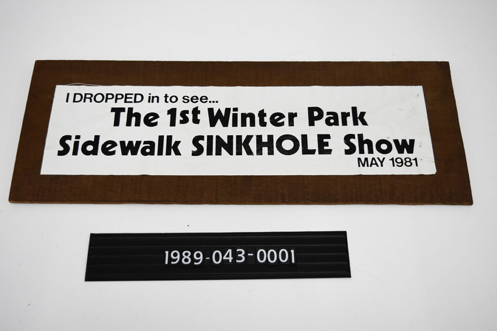 Bumper sticker reading "I dropped in to see The 1st Winter Park Sinkhole Show"