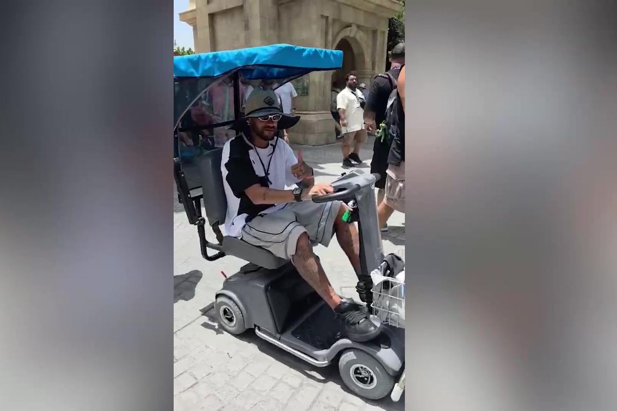 Video grab of Brazil legend Neymar seen driving a mobility scooter at Universal Orlando Resort after World Cup exit