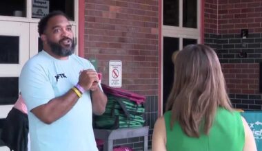Former football player James Coleman gives away hundreds of backpacks to Orlando students