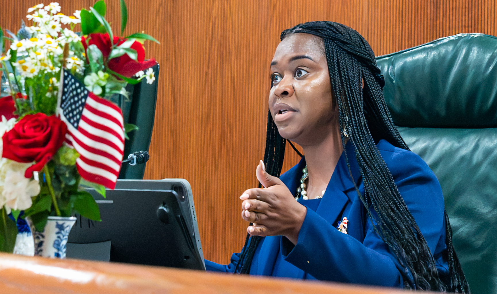 Commissioner Nadia Anderson speaks at a City Commission meeting