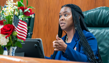 Commissioner Nadia Anderson speaks at a City Commission meeting