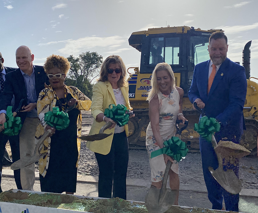 From left, Jacksonville City Council President Nick Howland, Council member Ju’Coby Pittman, Sulzbacher President and CEO Cindy Funkhouser, Mayor Donna Deegan and U.S. Rep. Aaron Bean, R-Florida, were among participants in a ceremonial groundbreaking July 10 for the second phase of construction on Sulzbacher’s homeless services campus between Interstate 95 and the Brentwood Golf Course.