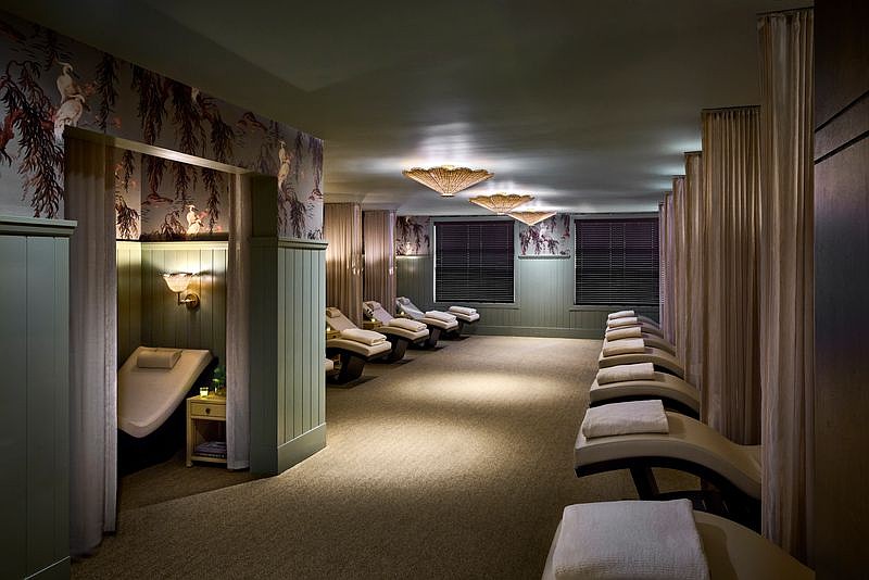 The renovated spa includes 19 upgraded treatment rooms, relaxation spaces, food and beverage service and a private courtyard with hot tubs, a cold plunge, lounge seating and native landscaping.