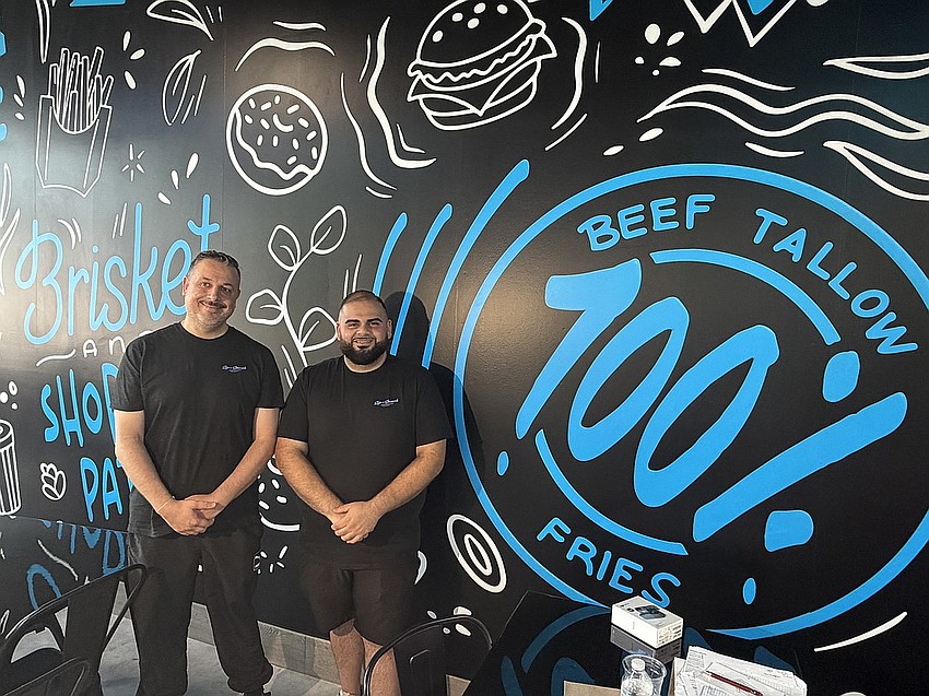 Jason Malih, right, with Elias Ishak opened Sip n’ Smash in July. Malih is working on a new concept called Sauce N’ Bone.