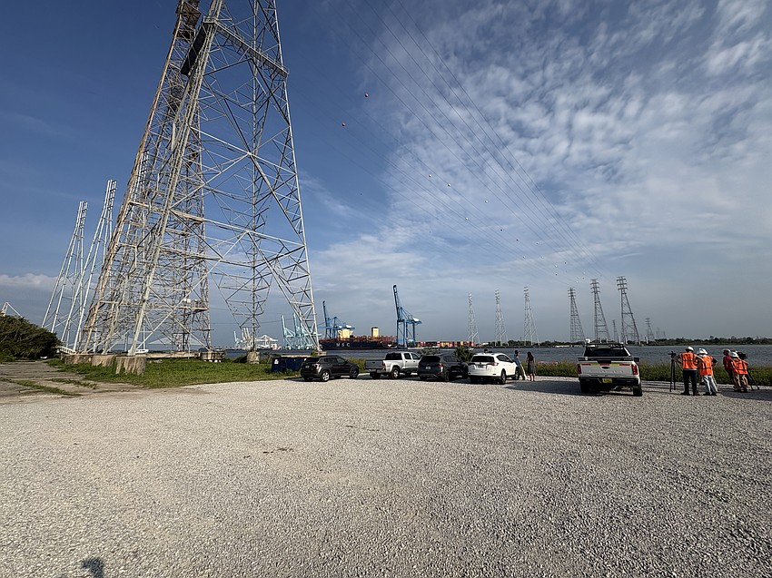 A view of the new and old towers of the $117 million Fulton Cut project to raise power lines above the St. Johns River to 225 feet from 175 feet near JaxPort’s Blount Island Marine Terminal.