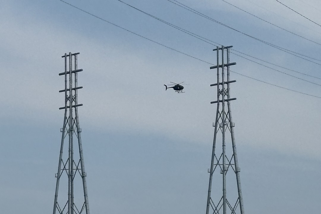 Work to raise power lines near JaxPort’s Blount Island takes to the sky