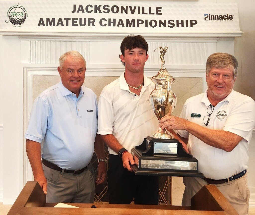 From left, Damon Olinto of Pinnacle Financial Partners, 2026 champion Cameron Reed and tournament chairman of JAGA Cary Helton