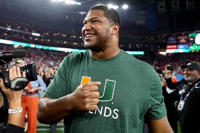 GLENDALE, ARIZONA - JANUARY 08: Calais Campbell #93 of the Arizona Cardinals celebrates after the game between the Ole Miss Rebels and the Miami Hurricanes during the 2025 College Football Playoff Semifinal at the VRBO Fiesta Bowl at State Farm Stadium on January 08, 2026 in Glendale, Arizona. ted the Rebels 31-27. (Photo by Chris Coduto/Getty Images)