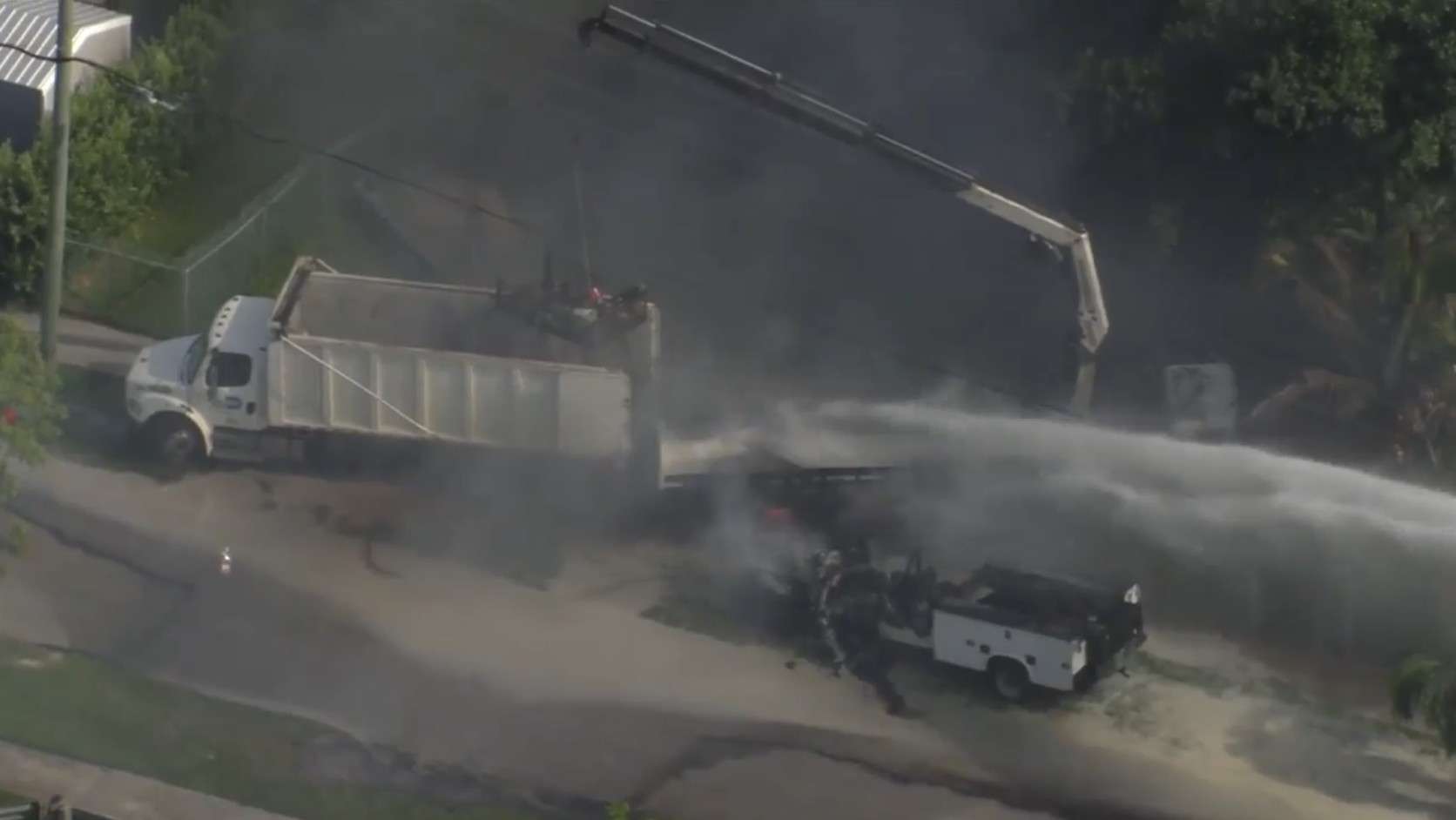 Public works driver hospitalized after contact with power line sparks bucket truck fire in SW Miami-Dade - WSVN 7News | Miami News, Weather, Sports