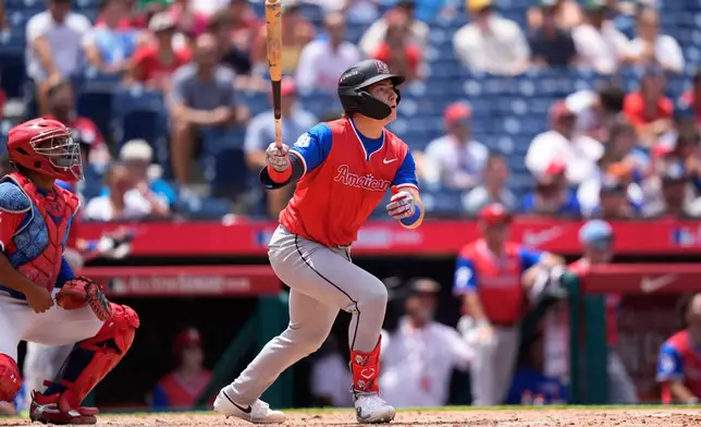 American League's Nathan Flewelling reacts to his two-run home run against National League pitcher Wen-Hui Pan in the sixth inning during the MLB All-Star Futures baseball game Sunday, July 12, 2026, in Philadelphia. (AP Photo/Chris Szagola)