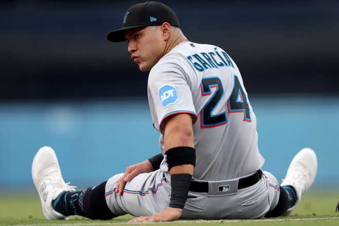Miami Marlins v Los Angeles Dodgers - Game Two LOS ANGELES, CALIFORNIA - AUGUST 19: Avisail Garcia #24 of the Miami Marlins warms up before the game against the Los Angeles Dodgers at Dodger Stadium on August 19, 2023 in Los Angeles, California. (Photo by Harry How/Getty Images)