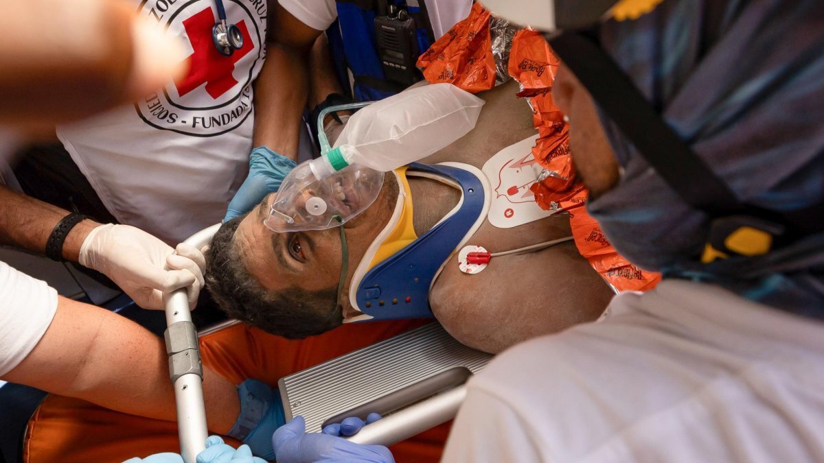 Rescue workers carry Hernán Alberto Gil Flores, 44, an earthquake survivor, in La Guaira, Venezuela, on Thursday. Photo by Ronald R. Pena/EPA Rescue workers carry Hernán Alberto Gil Flores, 44, an earthquake survivor, in La Guaira, Venezuela, on Thursday. Photo by Ronald R. Pena/EPA