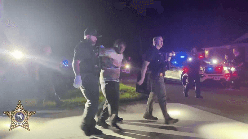 Deputies responded just after midnight to a home on Willowbrook Drive for reports of a domestic disturbance involving an armed man. Investigators said 32-year-old Joe Christopher Simmons Jr. allegedly fired a handgun inside the occupied residence while several family members were inside. (Lee County Sheriff's Office)