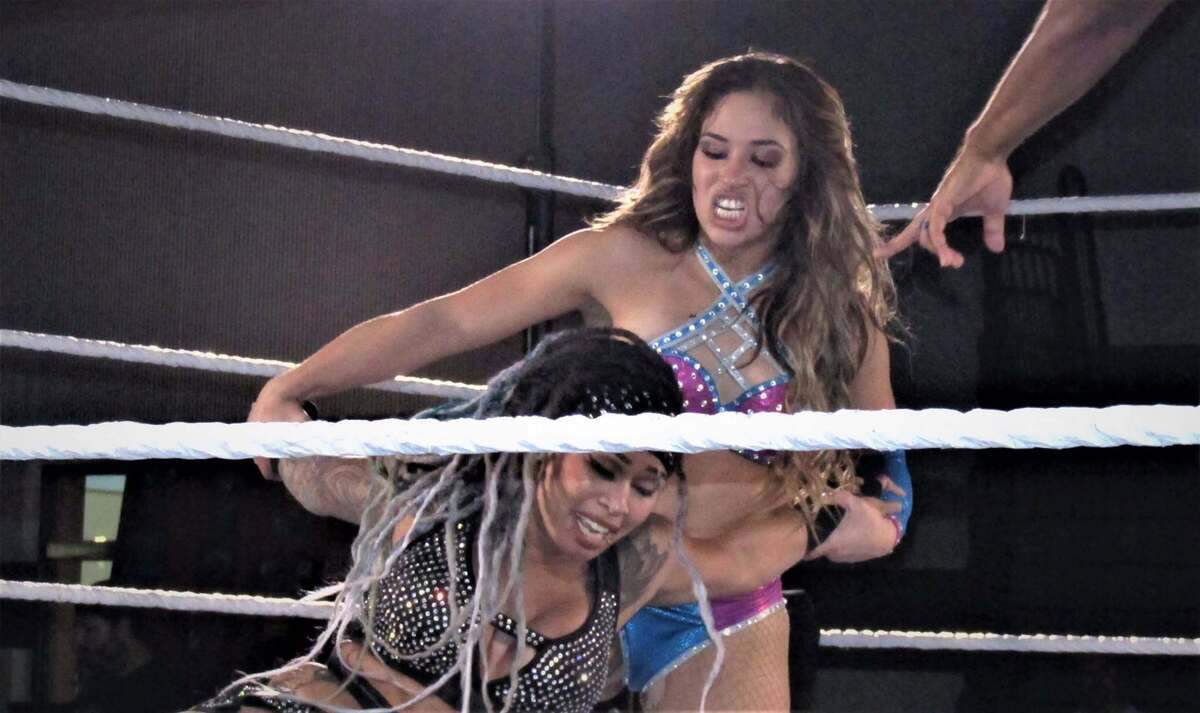 Lola Vice of Miami wrestles Kayden Carter of Winter Park at a WWE NXT show at the Havert L. Fenn Center in Fort Pierce.