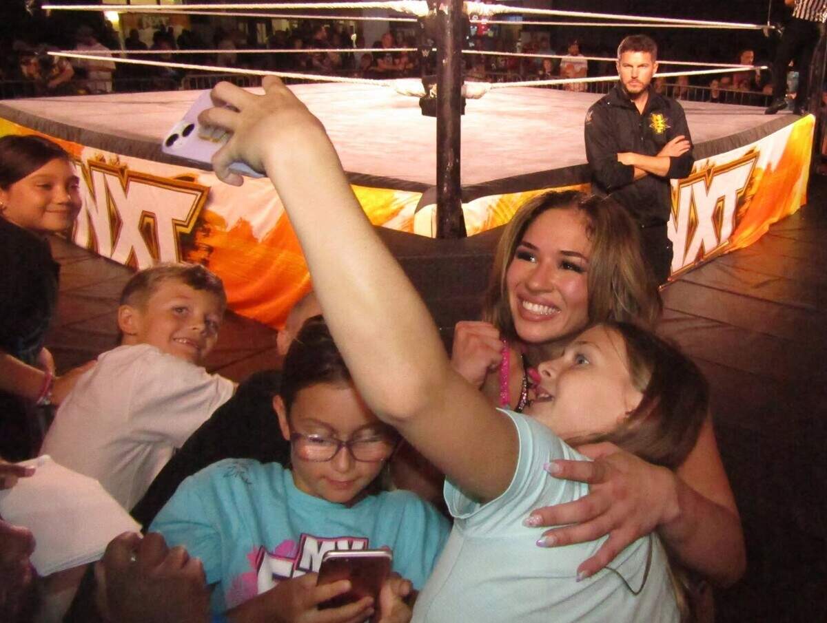 WWE NXT superstar Lola Vice, who is from Miami, with fans at an NXT show at the Havert L. Fenn Center in Fort Pierce.