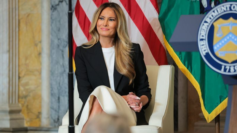 WASHINGTON, DC - JUNE 11: U.S. first lady Melania Trump speaks listens as U.S. Secretary of the Treasury Scott Bessent speaks during an event at the U.S. Treasury Department on June 11, 2026 in Washington, D.C. The first lady’s office held the event to announce the launch of “Fostering the Future Accounts” as part of her Fostering the Future initiative. (Photo by Anna Moneymaker/Getty Images)