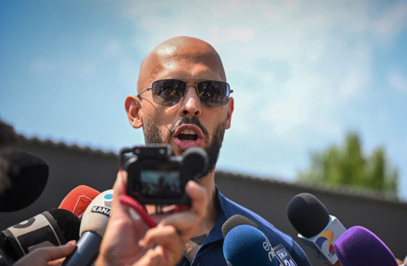 British-US former professional kickboxer and controversial influencer Andrew Tate addresses the media in Bucharest, Romania, Aug. 4, 2023.