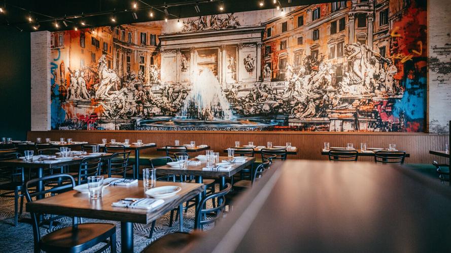 Trevi Fountain mural anchors dining room