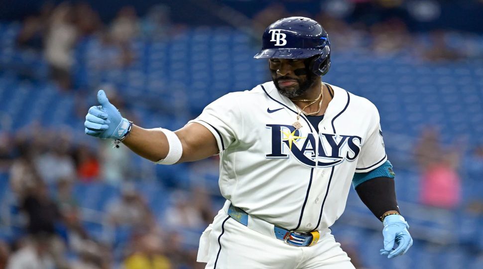 Tampa Bay Rays' Yandy Díaz celebrates as he rounds the bases after home run during the first inning of a baseball game against the Texas Rangers Wednesday, July 29, 2026, in St. Petersburg, Fla. (AP Photo/Jason Behnken)